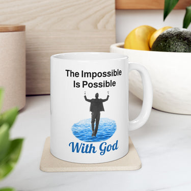 Motivational ceramic mug with “Impossible Man” design, man walking on water with the message